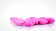 桩粉红色的平板电脑药丸孤立的白色背景norfloxacin治疗膀胱炎抗生素药物电阻制药行业药店背景全球医疗保健
