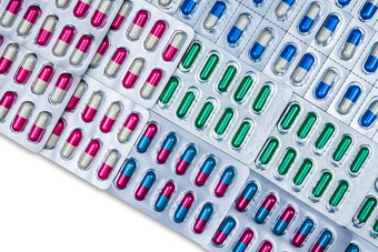 前视图色彩斑斓的胶囊药片泡包安排美丽的模式制药包装医学感染疾病抗生素药物合理的药物电阻