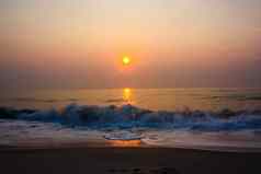 日落海明亮的太阳天空海滩景观