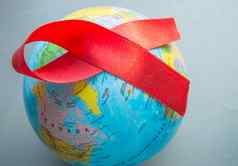 世界艾滋病一天12月特写镜头世界全球红色的丝带
