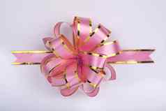 粉红色的圣诞节礼物丝带弓