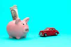 粉红色的小猪银行车表格有色概念储蓄财务状况贡献财产