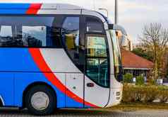 小屋白色红色的蓝色的现代之旅公共汽车运输旅行行业
