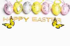 多色的复活节鸡蛋白色背景群木信快乐复活节快乐复活节