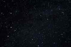 黑暗晚上长曝光照片很多星星星座城市晚上景观