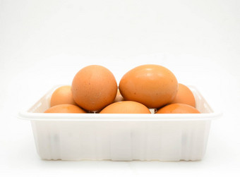 鸡蛋新鲜的棕色（的）鸡蛋白色塑料盒子