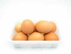 鸡蛋新鲜的棕色（的）鸡蛋白色塑料盒子