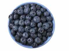 碗完整的新鲜的成熟的蓝莓白色背景