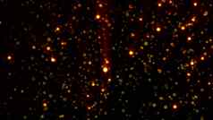 呈现金粒子微光创建散景黑色的背景电脑生成的摘要背景