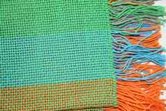 色彩斑斓的针织服装毯子梳子织机纱线