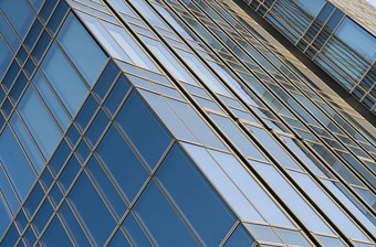 反射天空窗户建筑的角度来看低估角视图现代玻璃建筑摩天大楼蓝色的天空窗户业务逻辑层办公室企业建筑