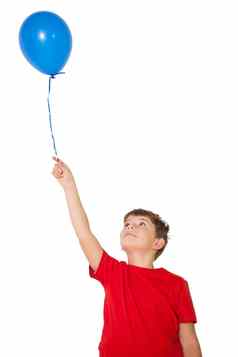 快乐男孩持有蓝色的气球