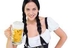 漂亮的啤酒节女孩持有啤酒大啤酒杯
