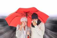复合图像夫妇冬天时尚打喷嚏伞