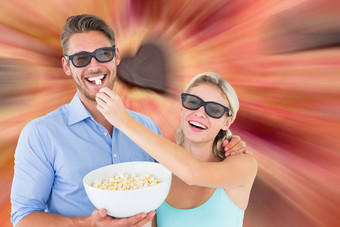 复合图像快乐年轻的夫妇穿眼镜吃爆米花