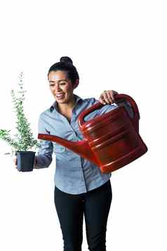 快乐女人浇水植物