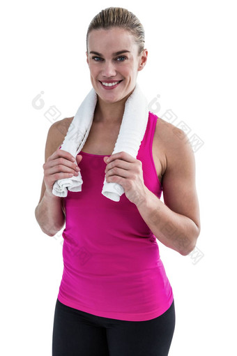肌肉发达的女人持有毛巾脖子