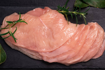 生切片鸡肉特写镜头sotilissimo特写镜头视图生新鲜的切切片鸡肉美味的饮食肉烹饪
