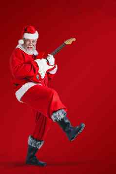 复合图像快乐的圣诞老人老人玩吉他