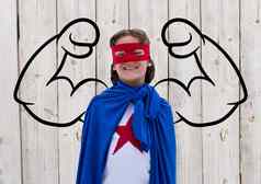 微笑男孩穿超级英雄服装站木背景