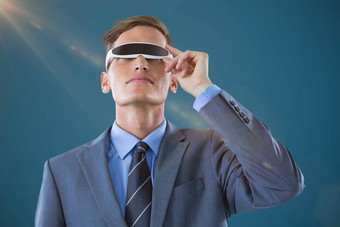 复合图像商人虚拟现实眼镜蓝色的背景