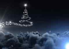 雪花圣诞节树模式形状发光的天空
