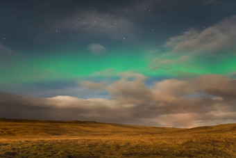 极光北欧化工冰岛北部灯闪亮的绿色晚上天空星号大七星