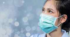 护士穿面具保护冠状病毒科维德