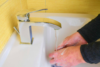 电晕病毒流感大流行保护洗手经常关闭洗手洗手肥皂温暖的水秒电晕病毒科维德预防