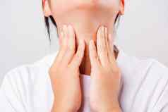 亚洲美丽的女人痛喉咙甲状腺腺问题
