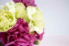 粉红色的紫色的黄色的绿色康乃馨白色淡紫色背景粉红色的花的地方文本母亲一天问候卡婚礼一天情人节一天