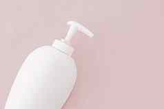 瓶抗菌液体肥皂手洗手液米色背景卫生产品健康护理