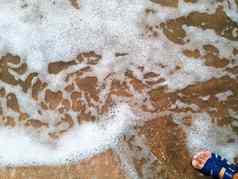妈妈波沿海沙子背景纹理海波泡沫沙子
