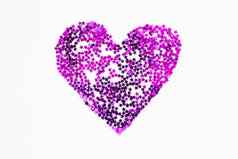 心使闪闪发光的品红色的紫色的conffetti闪亮的象征