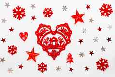 圣诞节一年假期背景装饰红色的心首页象征雪花明星五彩纸屑平躺前视图