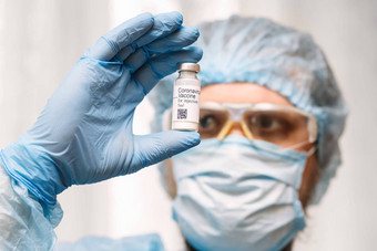 冠状病毒疫苗医生疫苗手持有冠状病毒疫苗灯泡新冠病毒