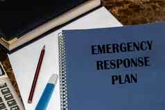 企业资源计划紧急响应过程文本写蓝色的书说谎办公室桌子上