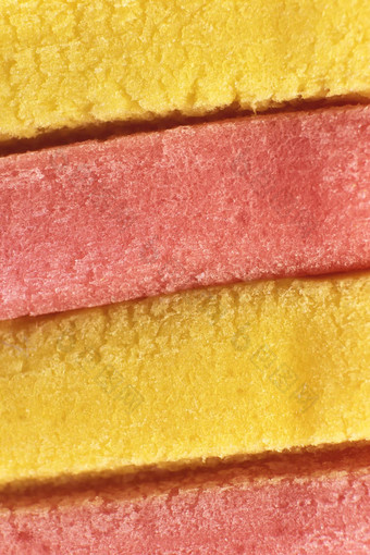 黄色的桃子彩色的泡沫口香糖纹理新鲜橡皮糖美味的背景美味的背景宏特写镜头
