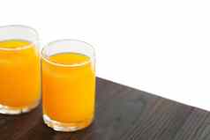 特写镜头橙色汁木表格喝健康的概念