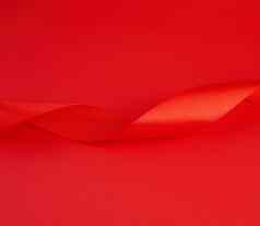 扭曲的红色的丝绸闪亮的丝带红色的背景节日desig