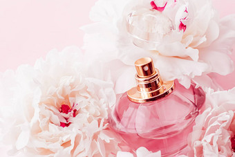 奢侈品香味瓶女孩香水产品背景牡丹花香水美品牌