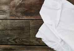 白色厨房纺织毛巾折叠灰色的木表格