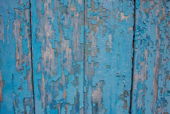 背景木通过画蓝色的纹理剥油漆董事会