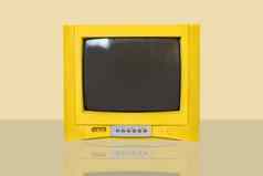复古的电视黄色的背景