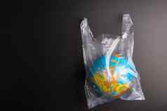 塑料袋地球世界全球孤立的黑色的背景萨维