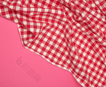 白色红色的网纹厨房毛巾粉红色的背景