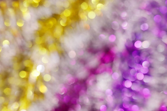 模糊<strong>图片</strong>黄色的黄金<strong>紫色</strong>的散景色彩斑斓的闪闪发光的快乐圣诞节快乐一年节日背景设计