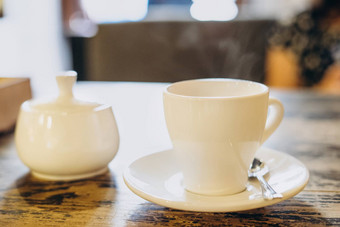 芳香新鲜的咖啡白色杯表示小白色杯糖碗夏天咖啡馆香新鲜的咖啡餐厅