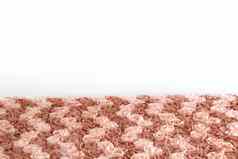 织物玫瑰棕色（的）柔和的花织物摘要纹理表格前白色墙背景