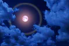 完整的粉红色的月亮你好月亮色彩斑斓的雷回来晚上云